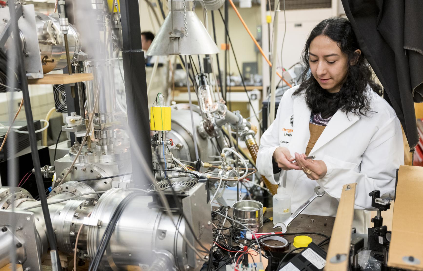 Marisol Trejo works on technology in the Kong lab.